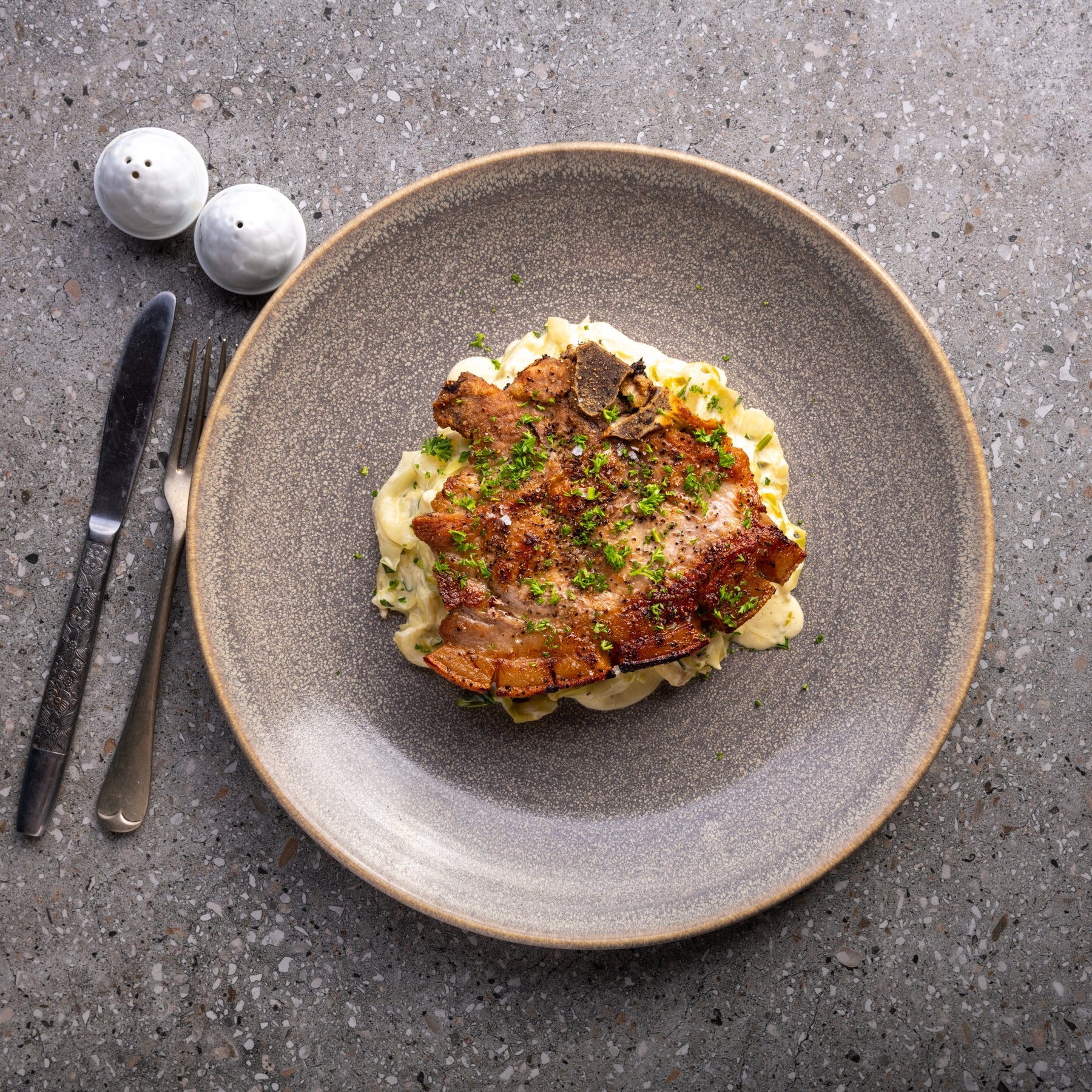 Apple Cider Pork Chop with Braised Creamy Cabbage