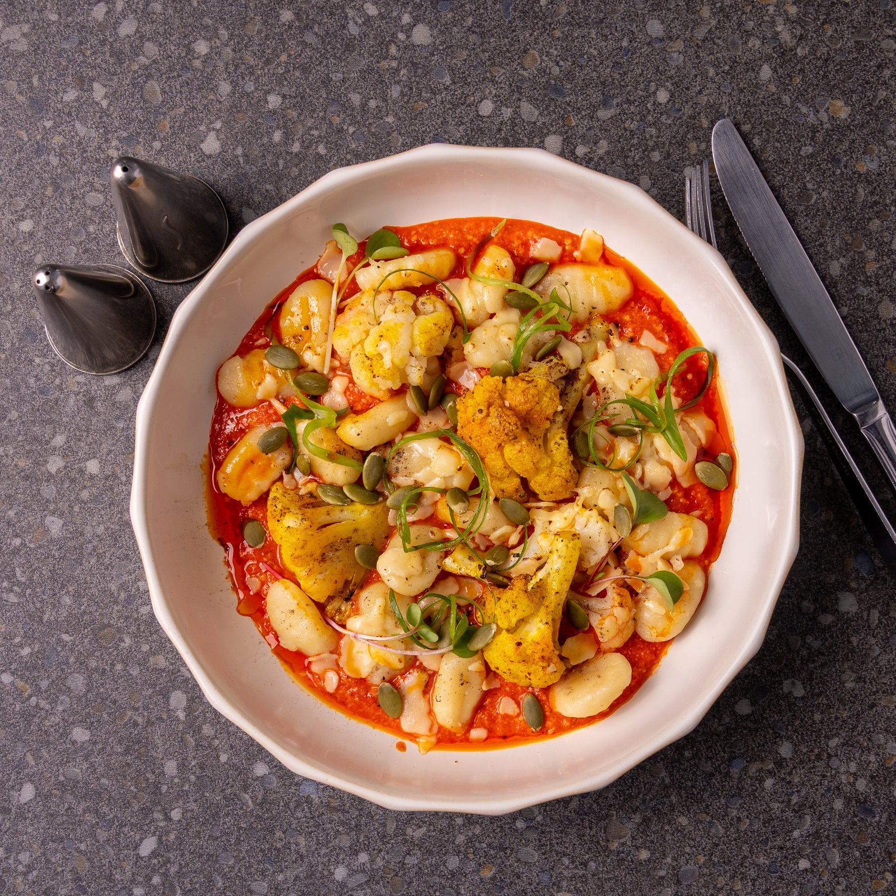 Family Gnocchi and Charred Cauliflower in a Roasted Red Pepper Pesto