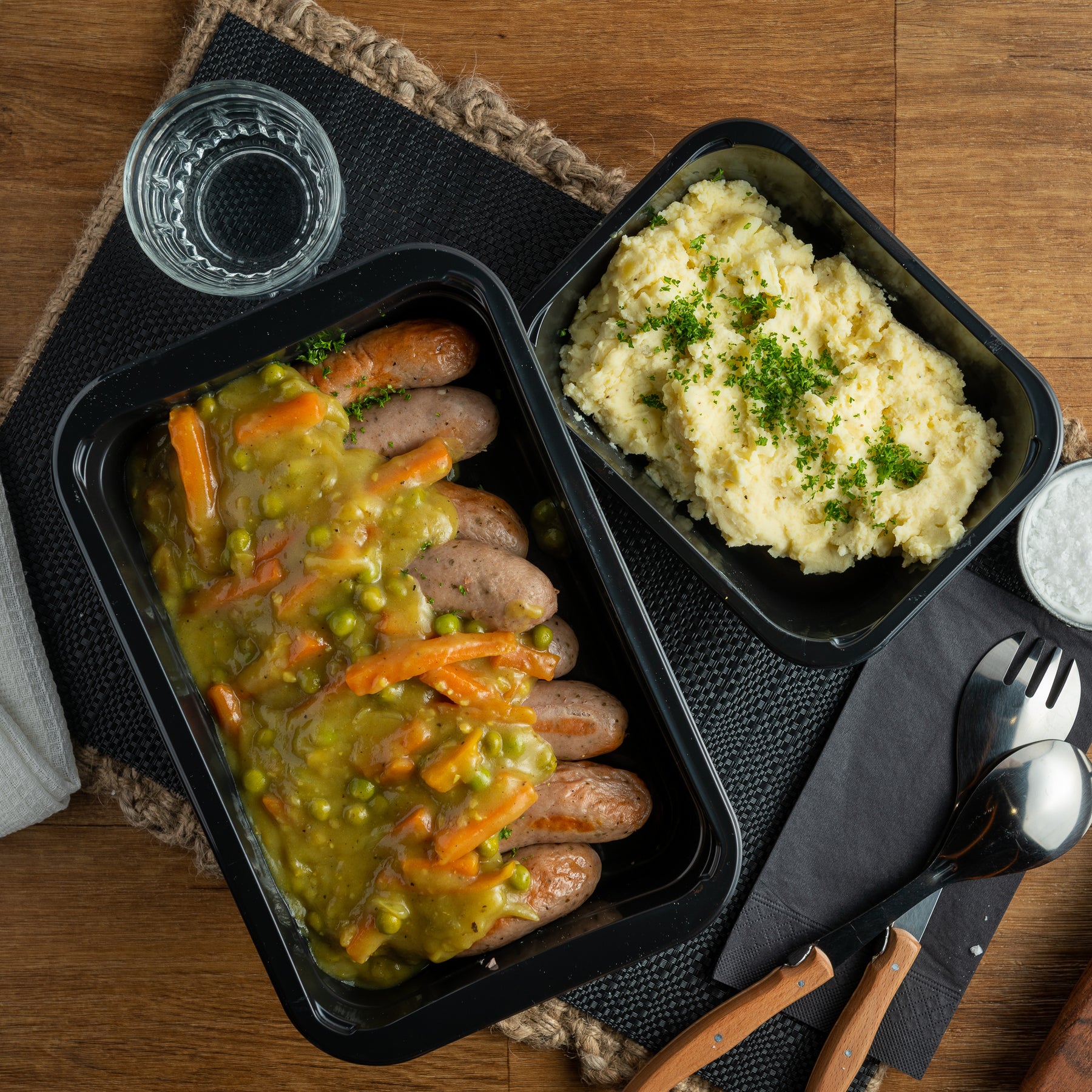 Curried sausages with a side of mustard mashed potatoes