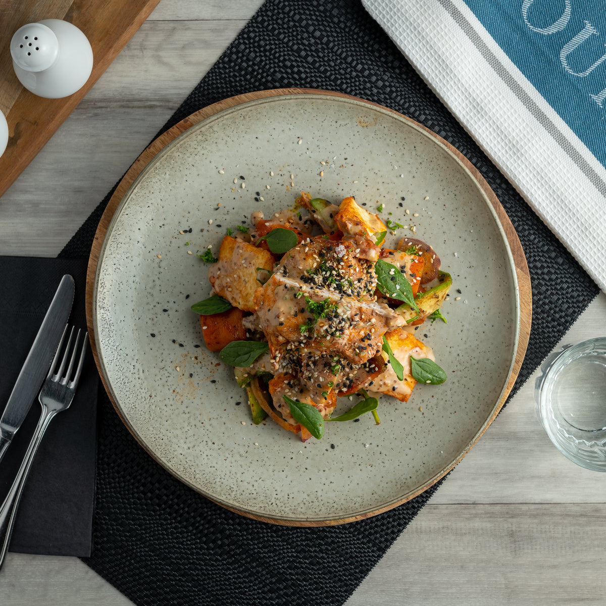 Gluten free Garlic chicken thighs with roasted carrots and baby spinach