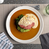 Corned beef with broccoli and mash potatoes with mustard cream