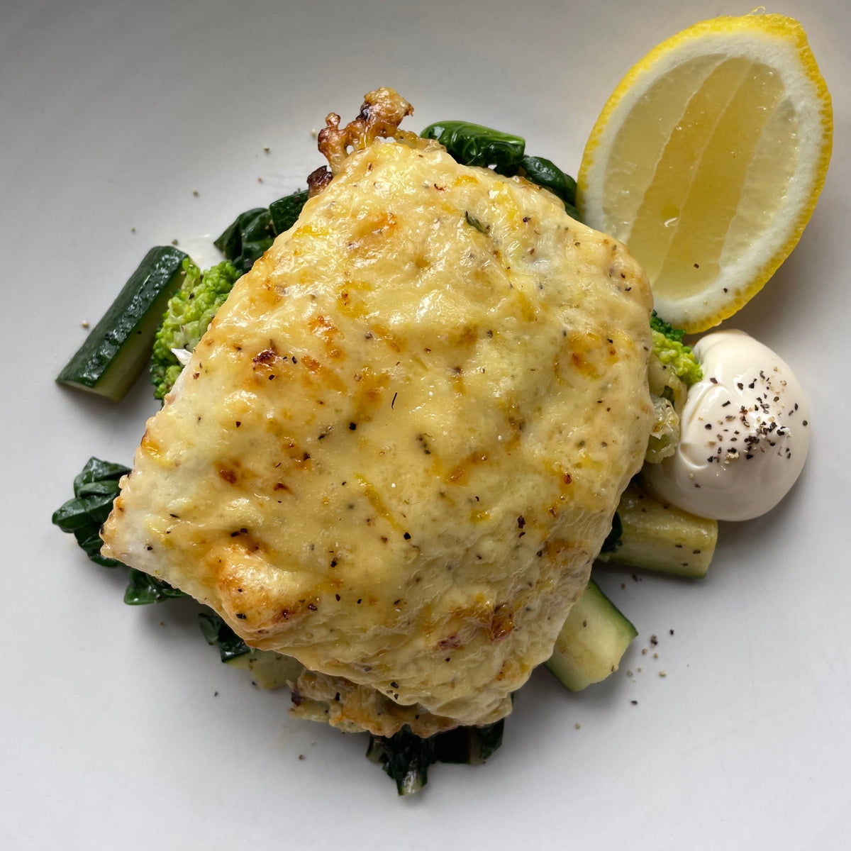 Parmesan Crusted Fish with Wilted Greens