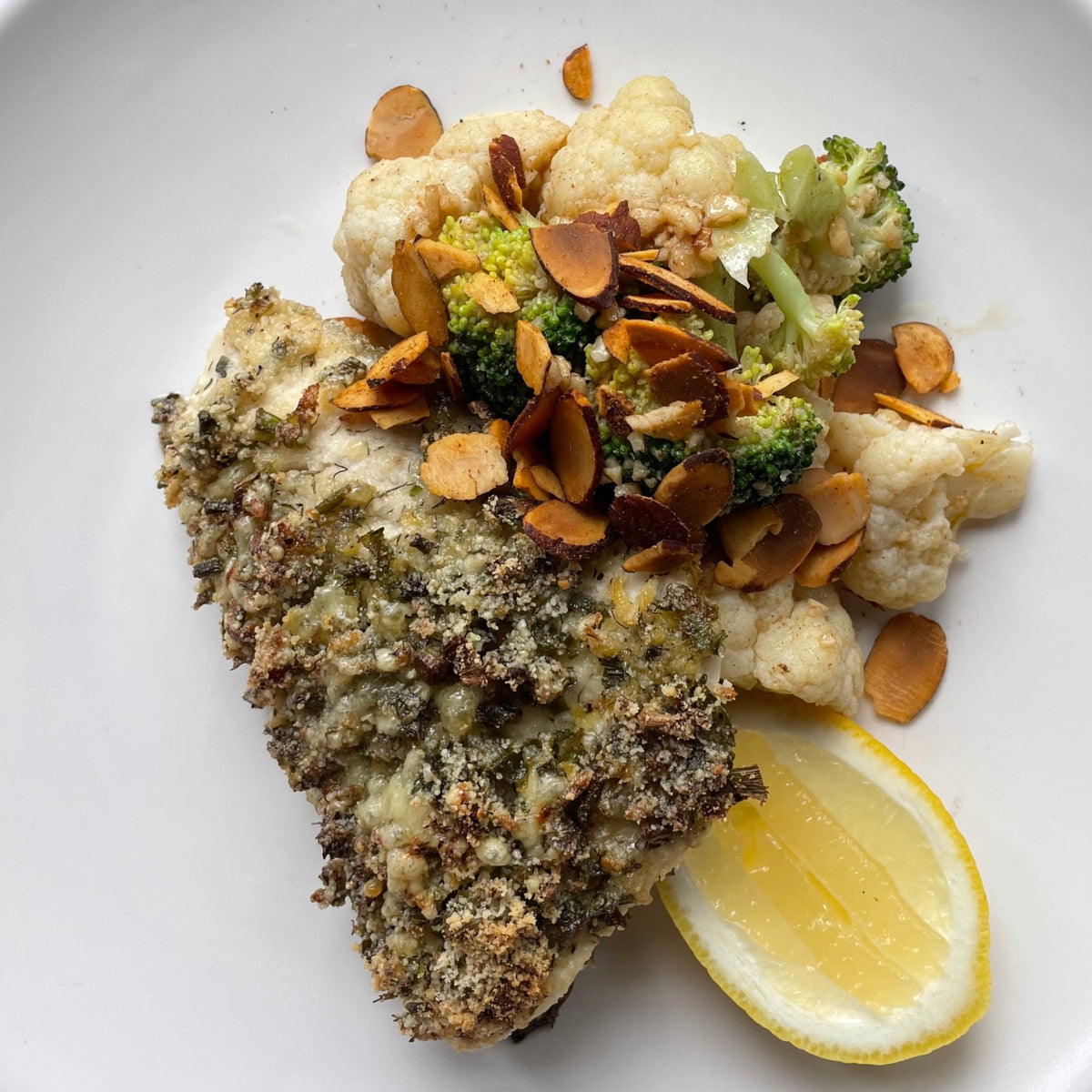 Zingy Lemon Fish with Steamed Vegetables, Garlic Butter and Spiced Almonds